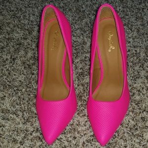 Neon pink heels